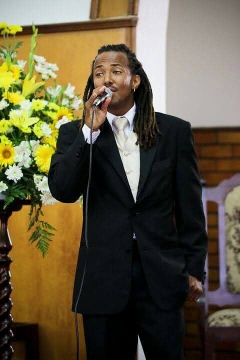 Julain MC'ing at a wedding